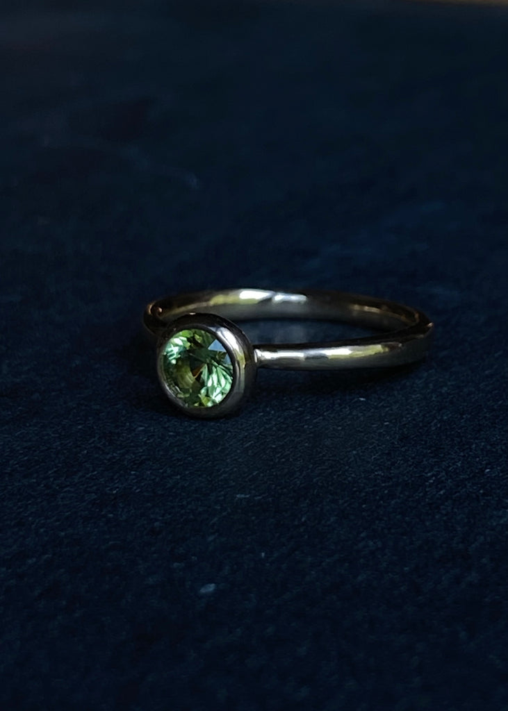 Peridot on 18k gold ring
