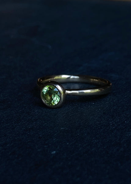 Peridot on 18k gold ring